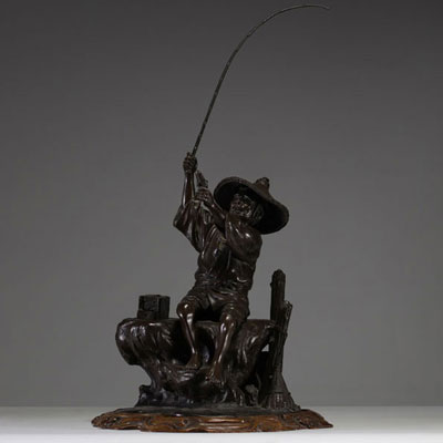 Japan - ‘The fisherman’ Bronze sculpture with brown patina, monogrammed on the back, late 19th century.