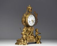 Pendule en bronze doré et ciselé, allégorie des arts aux Putti, cadran signé Cherier à Paris, d'époque Louis XVI.