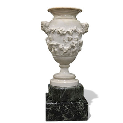 Imposing Carrara marble urn decorated with Satyrs and Putti in the Clodion style, first half of the 18th century.