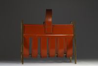 Jacques ADNET (1900-1984) Brass and orange leather magazine rack, circa 1940.