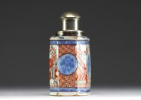 China - Polychrome porcelain tea caddy decorated with a village, silver stopper, 18th century.