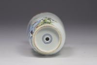 China - Famille Rose porcelain vase with floral and bird design, 19th century.