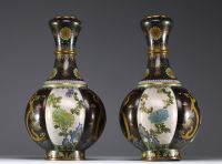 China - Pair of cloisonné enamel vases with flowers and dragons, Qing dynasty, circa 1900.