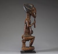 Afrique - Statue d’ancêtre Baoulé en bois sculpté, Côte d’Ivoire.