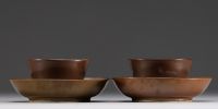 China - Set of two porcelain bowls and plates with interior floral decoration and nasturtium, 18th century.