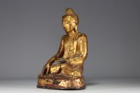 Asia - Gilded bronze Buddha in the position of taking the earth as witness, 19th century.