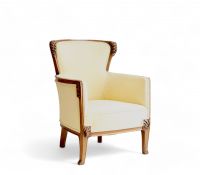 Louis MAJORELLE (1859-1926) Pair of Art Nouveau armchairs in moulded mahogany with fruit and flower motifs.