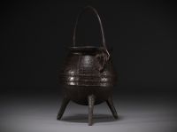 17th century cast iron tripod hearth cauldron.