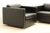 Walter KNOLL (1876-1971) Pair of black leather armchairs.