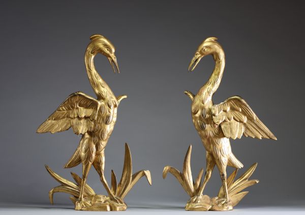 Paire d'échassiers en bois sculpté doré, éléments décoratifs du XIXème.