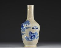 China - A 19th century Nanking porcelain vase decorated with Fô dogs on a crackled background.