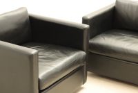 Walter KNOLL (1876-1971) Pair of black leather armchairs.