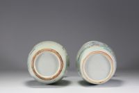 China - A pair of famille rose porcelain vases with courtesans, early 20th century.