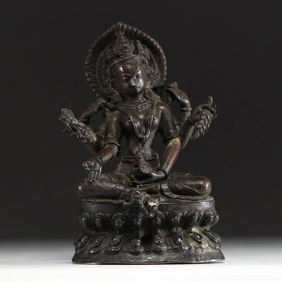 China - Tibet - Vasudhara, bronze sculpture with dark patina.