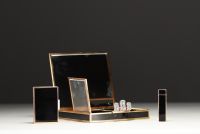 VAN CLEEF & ARPELS - Rare minaudière in black lacquer and 18k gold, clasp adorned with diamonds and rubies.