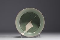 China - Celadon porcelain bowl on carved wooden base, Song dynasty.