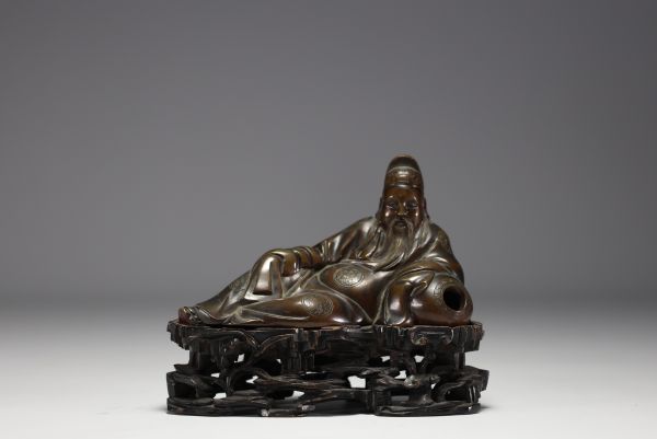 China - Li Bai Qing, bronze statue on openwork wooden base, Qing period.