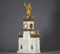 Pendule de style néo-gothique en marbre blanc et bronze doré surmontée de Saint Jean-Baptiste.