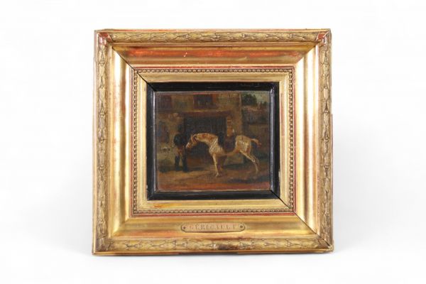 Huile sur toile représentant un cheval à l’écurie, accompagné de son palefrenier, dans une ambiance sombre et intime. Une plaque apposée sur le cadre porte le nom de Géricault