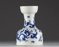 China - A blue-white porcelain vase decorated with dragons, Qing mark under the piece, 19th century.
