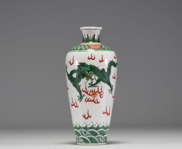 China - A 19th century green family polychrome porcelain vase decorated with a dragon.