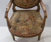 Important set of carved and gilded wood salon furniture, fine Aubusson tapestry including a sofa and a suite of four bergère armchairs, 19th century.