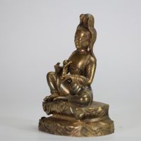 CHINE, DYNASTIE QING, XIXe SIÈCLE Figure de Songzi Guanyin Bronze doré.