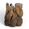 Ange en bois sculpté. polychromé et doré . XVIIe siècle.