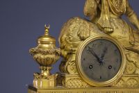 Pendule et candélabres en bronze doré à sujet Orientaliste, début XIXe siècle.