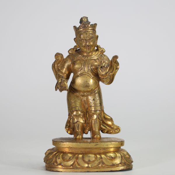 TIBET, XIXe SIÈCLE Roi gardien (Dharmapala) Bronze doré.