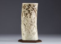 Japan - Carved ivory vase on a wooden base Meiji period circa 1900.