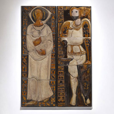 Pair of imposing glazed ceramic bas-relief figures, circa 1950-60.