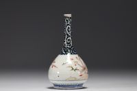 Japan - Sake bottle in porcelain with floral decoration.