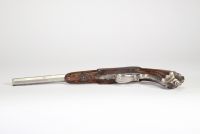 Pistolet de tir système Flobert, canon octogonal, crosse en noyer, fin XIXème.