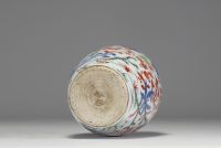 China - A polychrome porcelain vase decorated with bamboos, flowers and birds, 17th century.