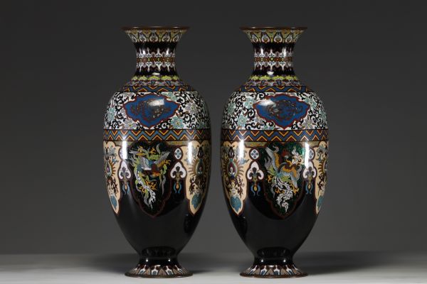 Japan - A pair of cloisonné vases with floral and phoenix decoration, Meiji period.