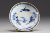 China - Set of four polychrome porcelain bowls and plates with floral decoration and ducks.18th