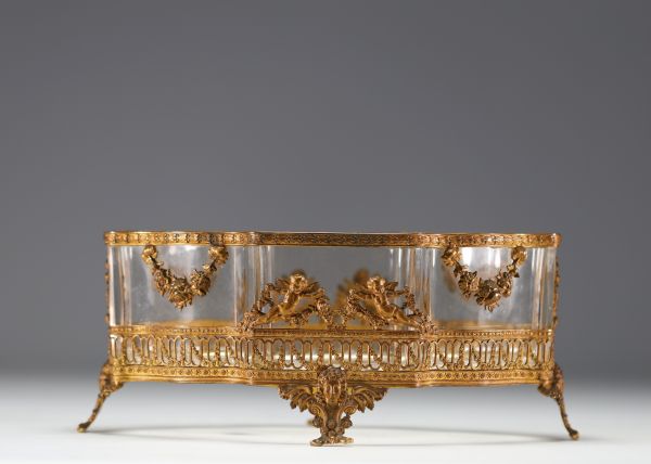 Gilt bronze and chased planter with Putti decoration, glass bowl, 19th century.