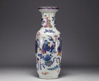 China - Large polychrome porcelain vase richly decorated with figures and furniture, 19th century.