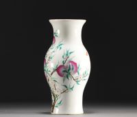 China - Porcelain vase with nine peaches design, famille rose, Qing period.