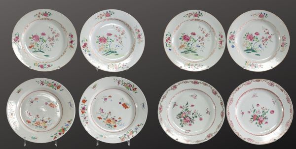Set of eight plates in pink family polychrome porcelain, 18th century.