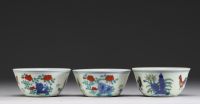 China - Set of three porcelain bowls decorated with roosters, hens and chicks in Ducaï enamels.