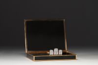 VAN CLEEF & ARPELS - Rare minaudière in black lacquer and 18k gold, clasp adorned with diamonds and rubies.