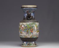 Chine - Vase en porcelaine de Nankin à décor scène de batailles, XIXe siècle.