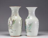 China - A pair of famille rose porcelain vases with courtesans, early 20th century.