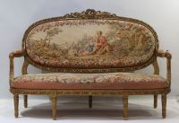 Important set of carved and gilded wood salon furniture, fine Aubusson tapestry including a sofa and a suite of four bergère armchairs, 19th century.