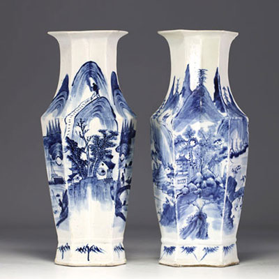 China - Pair of blue-white porcelain vases with landscape decoration, 19th century.