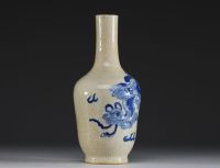 China - A 19th century Nanking porcelain vase decorated with Fô dogs on a crackled background.