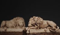 Pair of sculpted marble Lions, probably 18th century.