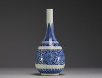 China - A white-blue porcelain vase with floral decoration, Yongzheng mark, 19th century.